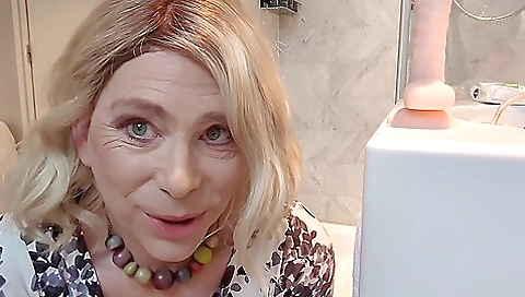 Horny blonde milf with a big ass fucks a man at a hotel