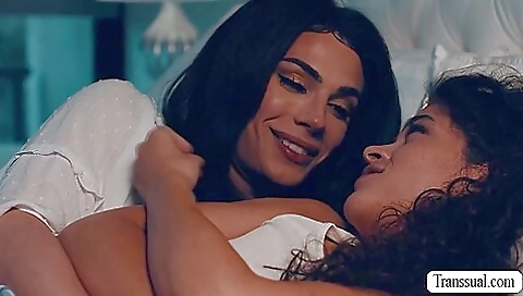 Busty redhead and her stepmom have sex in the kitchen